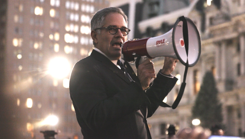 a man using a bullhorn to speak